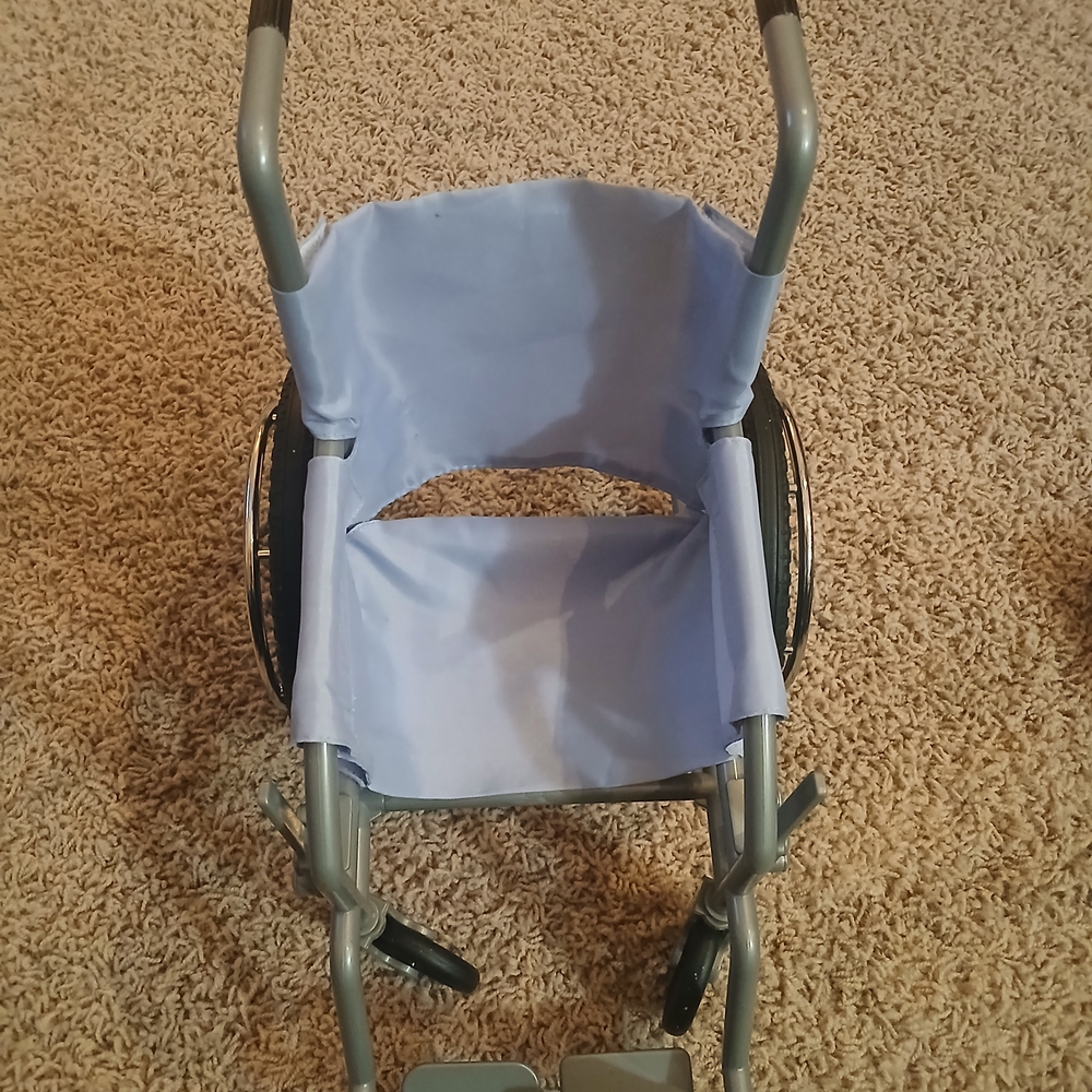 Light Blue Wheelchair with Gray Frame